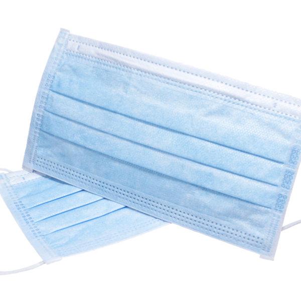 Medical protective face masks on white surface